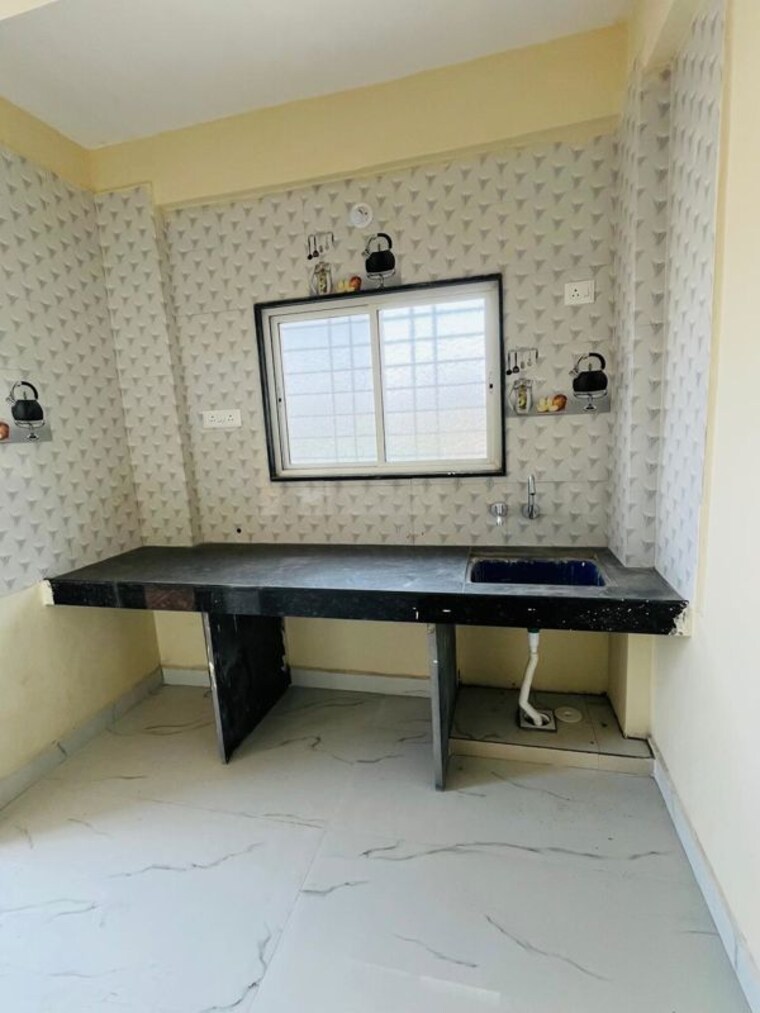 Kitchen, wadgaon sheri 1 Bedroom 600 Sq.Ft. Apartment In Wadgaon Sheri Pune 10619582