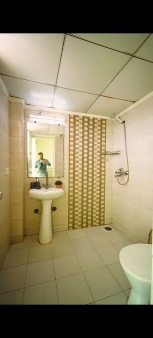 Bathroom in 2.5 BHK Apartment at Gaur City 2 - 12th Avenue, Sector 16c Greater Noida – for Sale