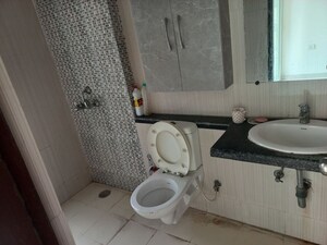 Bathroom in 2.5 BHK Apartment at Mahagun Mirabella, Sector 79 – for Sale