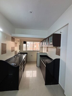 Kitchen in 2 BHK Apartment at Rajveer Palace II, Pimple Saudagar – for Rent