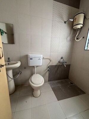 Bathroom in 2 BHK Apartment at Rajveer Palace II, Pimple Saudagar – for Rent