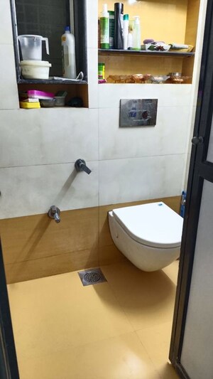 Bathroom in 3 BHK Apartment at Riddhi Gardens CHS, Malad East – for Rent