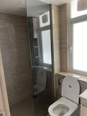 Bathroom in 3.5 BHK Builder Floor at DLF Gardencity Enclave, Sector 93 – for Rent