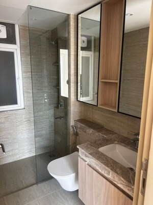 Bathroom in 3.5 BHK Builder Floor at DLF Gardencity Enclave, Sector 93 – for Rent