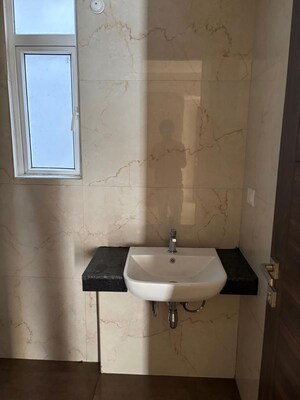 Bathroom in 2.5 BHK Builder Floor at Smart World Gems, Sector 89 – for Rent