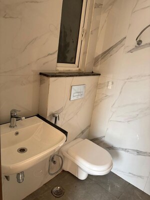 Bathroom in 2.5 BHK Builder Floor at Smart World Gems, Sector 89 – for Rent