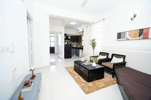 Living Room in 2 BHK Apartment at Signature Global Synera, Sector 81 – for Sale