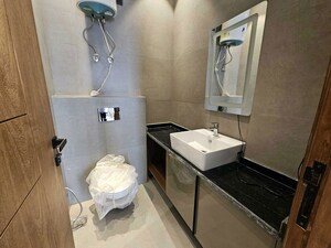 Bathroom in 4 BHK Builder Floor at Palam Vihar – for Rent
