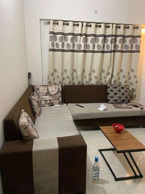Living Room in 1.5 BHK Apartment at Lodha Amara, Kolshet Road – for Rent