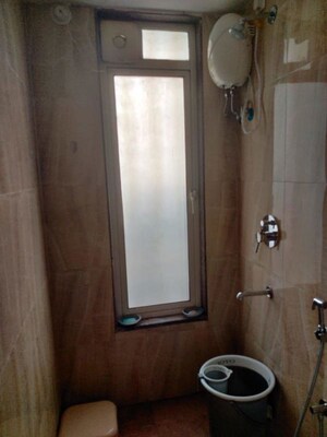 Bathroom in 1.5 BHK Apartment at Lodha Amara, Kolshet Road – for Rent