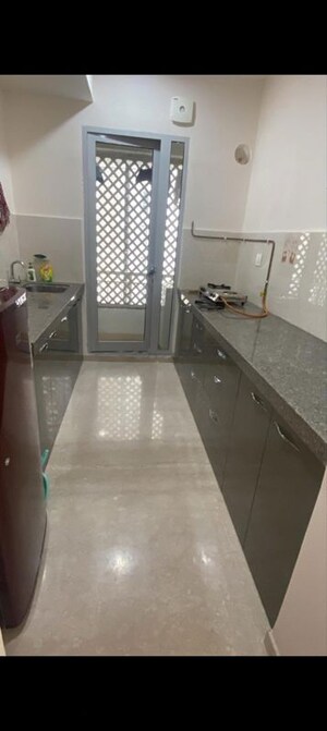 Kitchen in 2 BHK Apartment at Piramal Vaikunth, Balkum Pada – for Rent