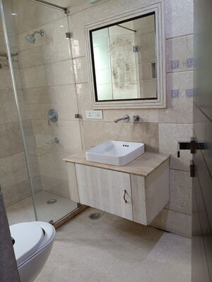 Bathroom in 4 BHK Builder Floor at Maharani Bagh – for Sale