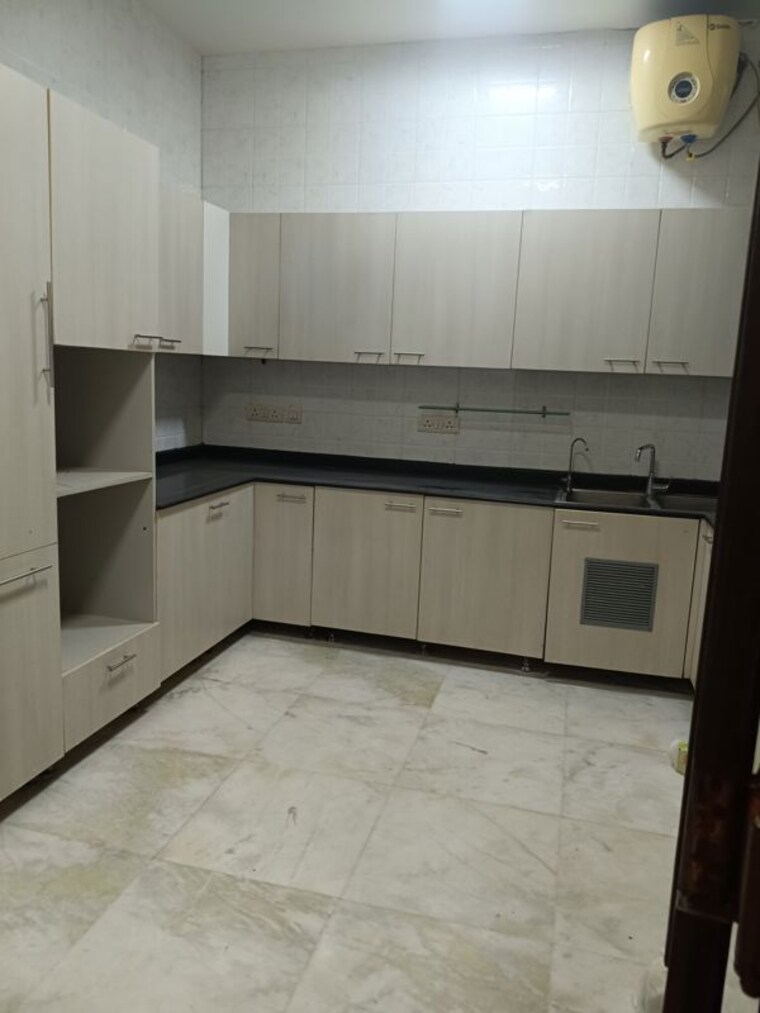 Kitchen, maharani bagh 4 Bedroom 805 Sq.Yd. Builder Floor In Maharani Bagh Delhi 10619955