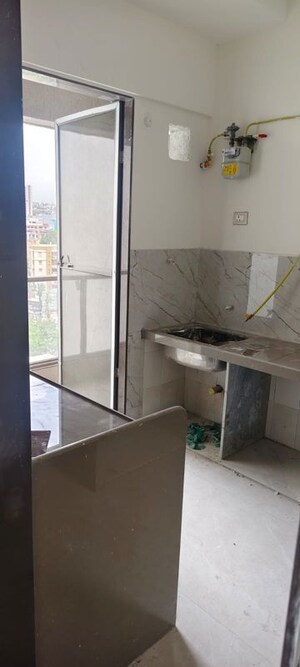 Kitchen in 3 BHK Apartment at Sati Darshan Apartment, Malad West – for Sale