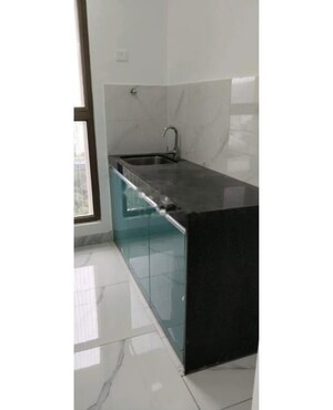 Kitchen in 1 BHK Apartment at Raymond Ten X Habitat, Pokhran Road No Two – for Rent