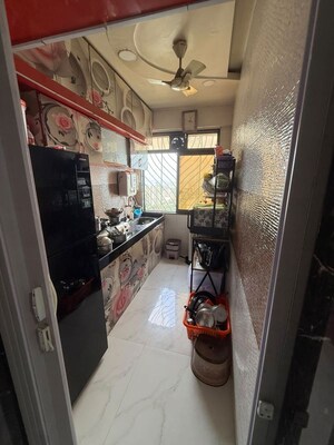 Kitchen in 2 BHK Apartment at Nirban Bismillah Heights, Nagpada – for Sale