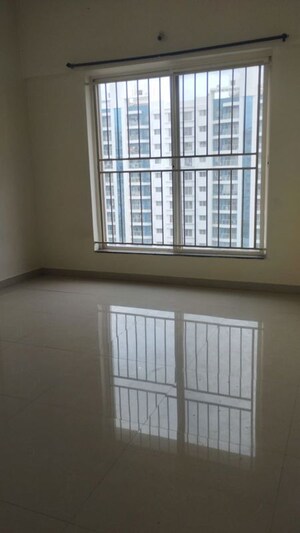 Room in 2 BHK Apartment at Megapolis Sparklet, Hinjewadi – for Rent