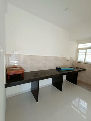 Kitchen in 2 BHK Apartment at Dahanukar Colony – for Rent