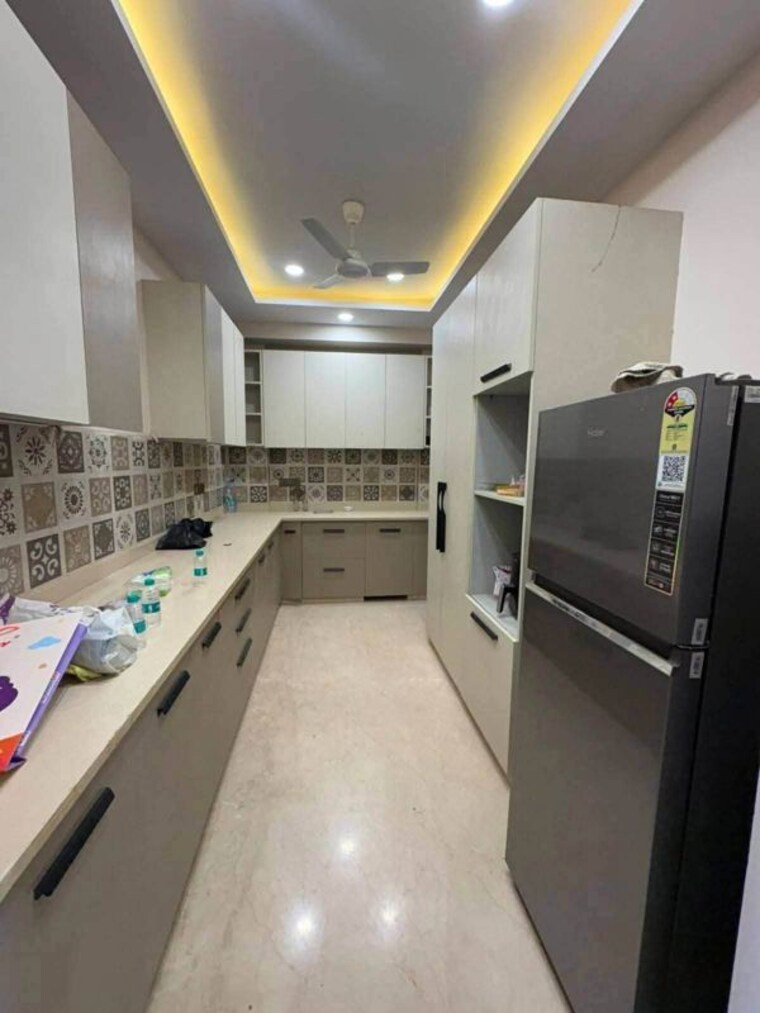 Kitchen, bptp-amstoria 3 Bedroom 181 Sq.Yd. Builder Floor In Sector 102 Gurgaon 10620172