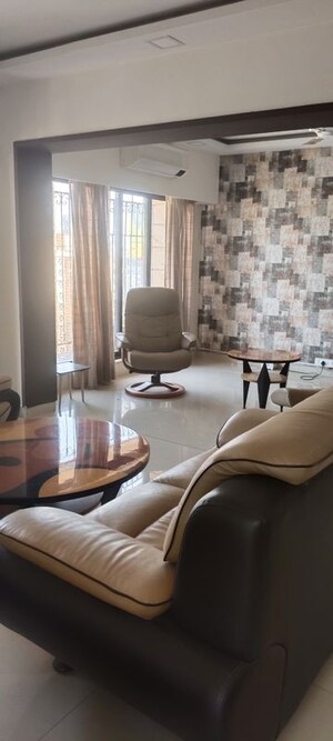 Living Room in 4 BHK Apartment at K Raheja Raheja Classique, Andheri West – for Rent