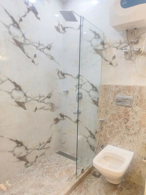 Bathroom in 4 BHK Builder Floor at Green Park Extension – for Sale