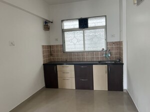 Kitchen in 2 BHK Apartment at Palladium Homes, Dhanori – for Rent