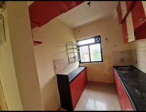 Kitchen in 1.5 BHK Apartment at Green Square, Kasarvadavali – for Rent