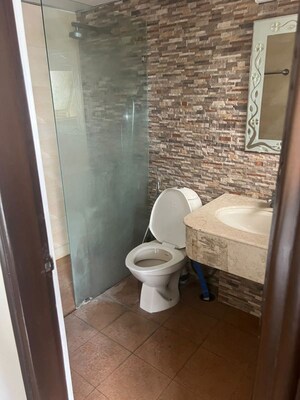 Bathroom in 2 BHK Apartment at Prestige St Johns Woods, Koramangala – for Rent
