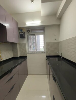 Kitchen in 1 BHK Apartment at Lodha Amara, Kolshet Road – for Rent