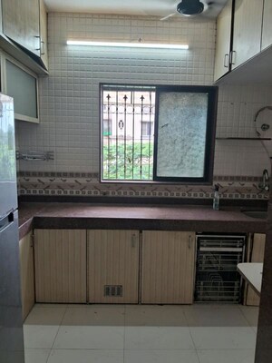 Kitchen in 2 BHK Apartment at Regency Estate, Dombivli East – for Rent