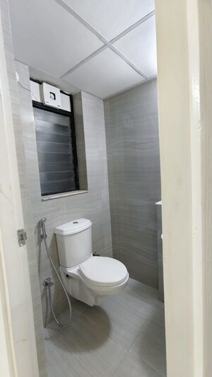 Bathroom in 1.5 BHK Apartment at Runwal Gardens, Dombivli East – for Rent