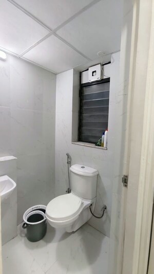 Bathroom in 1.5 BHK Apartment at Runwal Gardens, Dombivli East – for Rent