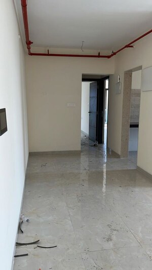 Room in 2 BHK Apartment at IM Applaud 38, Goregaon East – for Rent