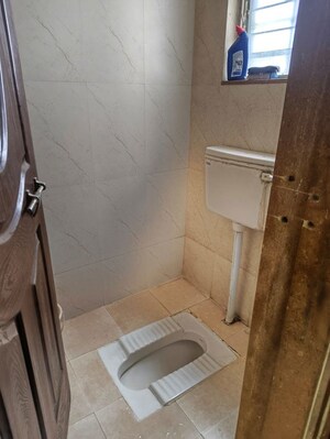 Bathroom in 1 BHK Apartment at Tulsi Namdev Rukari Baug, Bhekrai Nagar – for Rent