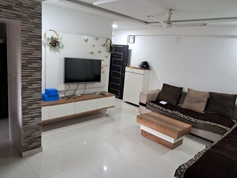 Living Room, satellite 2 Bedroom 1150 Sq.Ft. Apartment In Satellite Ahmedabad 10620461