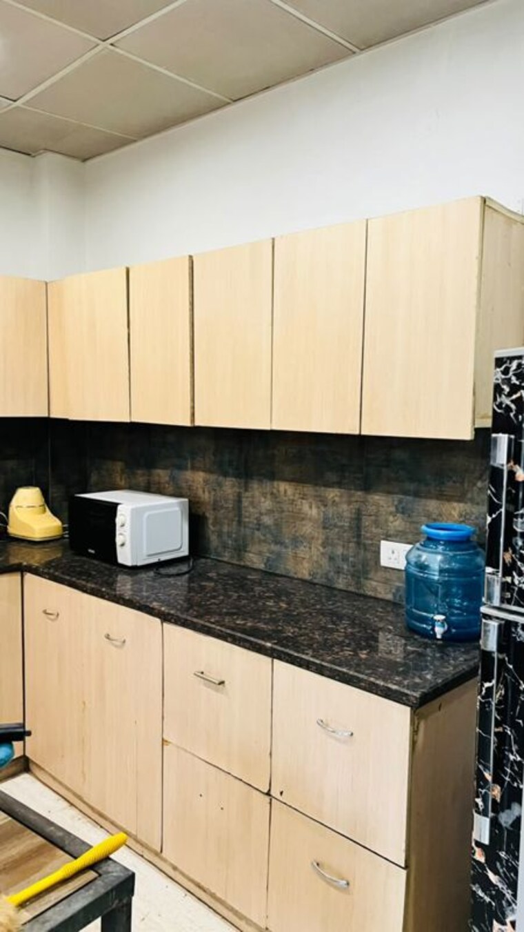 Kitchen, sector 57 3.5 Bedroom 250 Sq.Yd. Builder Floor In Sector 57 Gurgaon 10620463