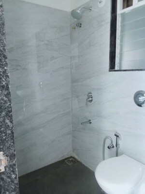 Bathroom in 1 BHK Apartment at Anant Metropolis Insignia Towers, Kasarvadavali – for Rent