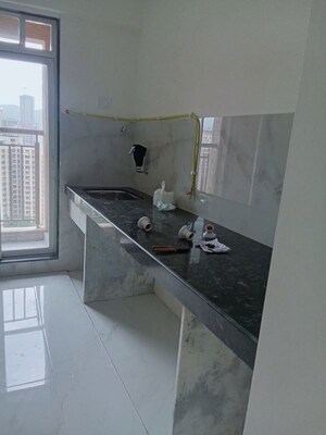 Kitchen in 1 BHK Apartment at Anant Metropolis Insignia Towers, Kasarvadavali – for Rent
