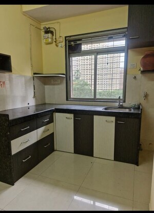 Kitchen in 1 BHK Apartment at Runwal Eirene, Balkum Pada – for Rent