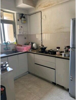 Kitchen in 2 BHK Apartment at Vijay Orovia, Ghodbunder Road – for Sale