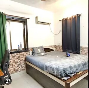 Bedroom in 1 BHK Apartment at New Gitanjali CHS, Malad East – for Rent