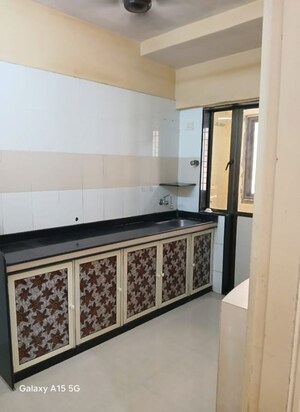 Kitchen in 1 BHK Apartment at New Gitanjali CHS, Malad East – for Rent