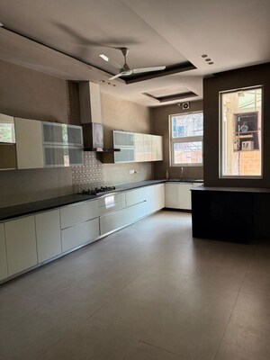 Kitchen in 4 BHK Builder Floor at Golf Course Extension – for Rent