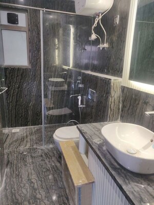 Bathroom in 4 BHK Builder Floor at Golf Course Extension – for Rent
