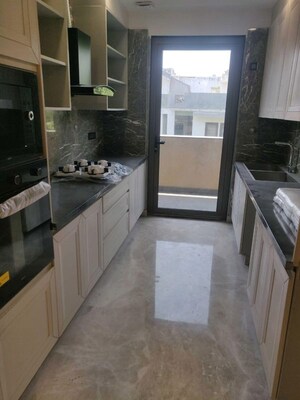 Kitchen in 4 BHK Builder Floor at Golf Course Extension – for Rent