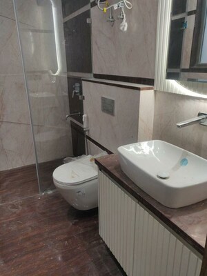 Bathroom in 4 BHK Builder Floor at Golf Course Extension – for Rent