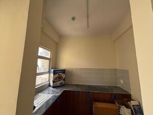 Kitchen in 3 BHK Apartment at Amrapali Verona Heights Phase II, Amrapali Leisure Valley – for Sale