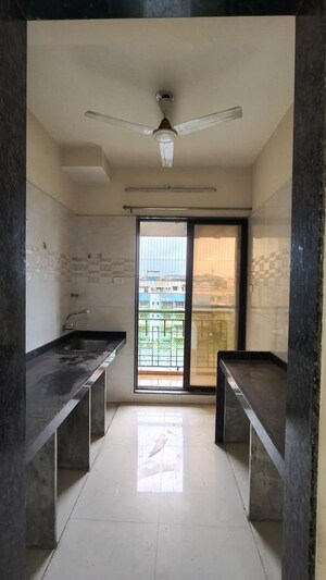 Kitchen in 2 BHK Apartment at Samarth Sai Seasons Sahara, Kalyan East – for Rent