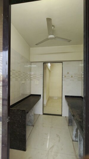 Kitchen in 2 BHK Apartment at Samarth Sai Seasons Sahara, Kalyan East – for Rent