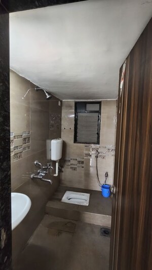 Bathroom in 2 BHK Apartment at Samarth Sai Seasons Sahara, Kalyan East – for Rent